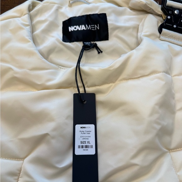 Roller Coaster Puffer Vest" in Off White from the brand Fashion Nova. - Picture 8 of 10